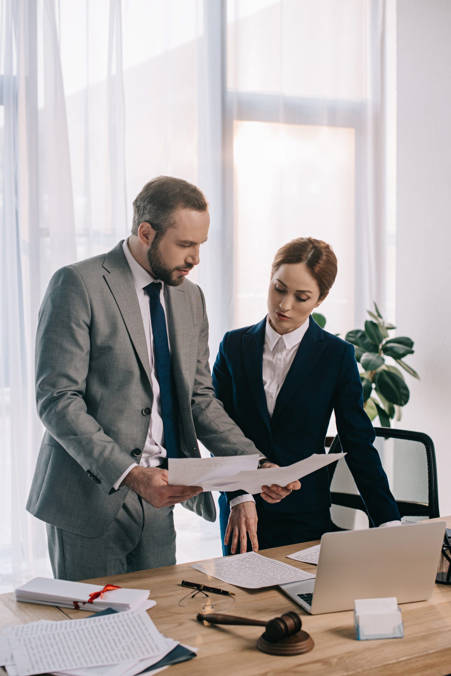 lawyers in suits working together in office