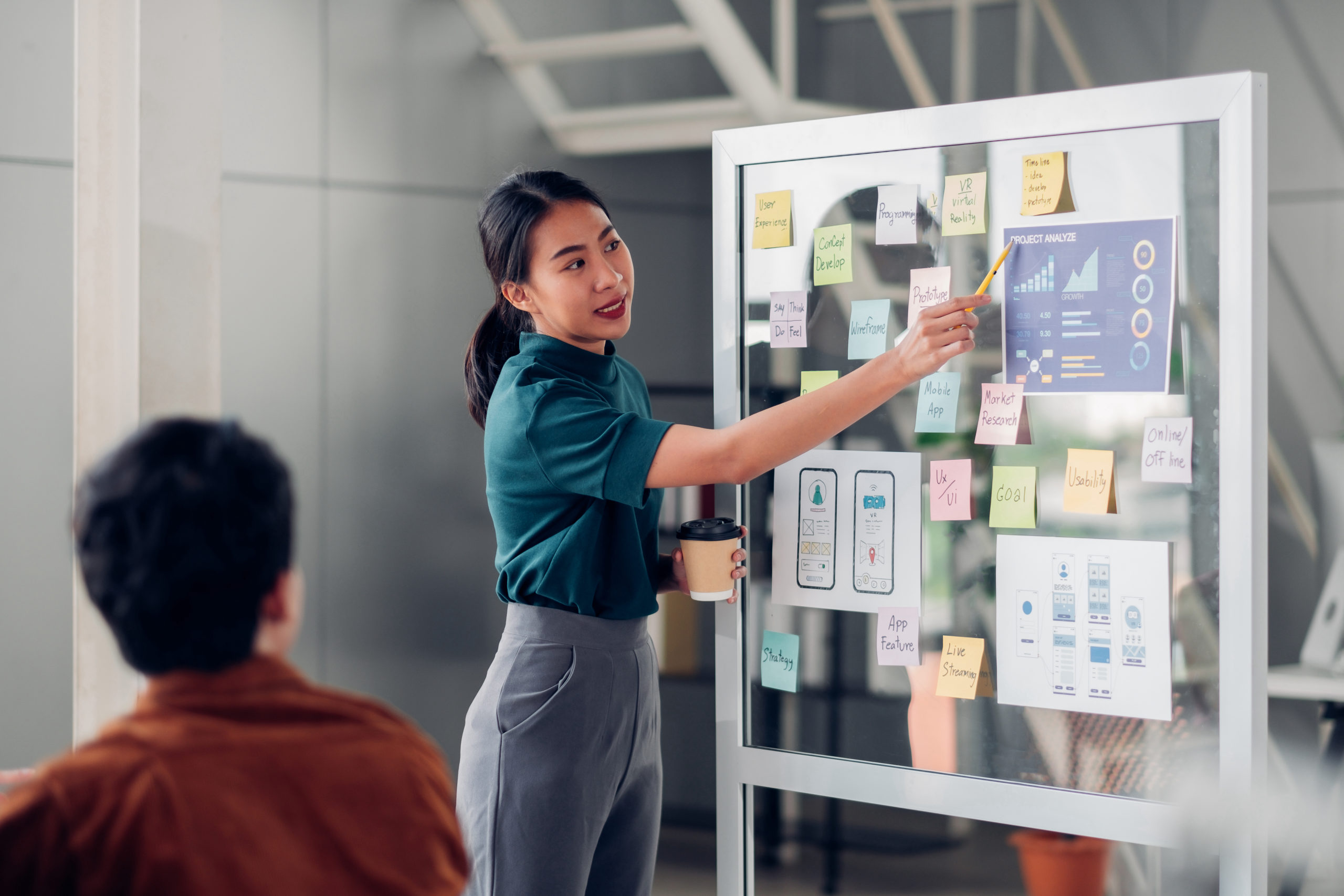 woman presenting campaign to a team