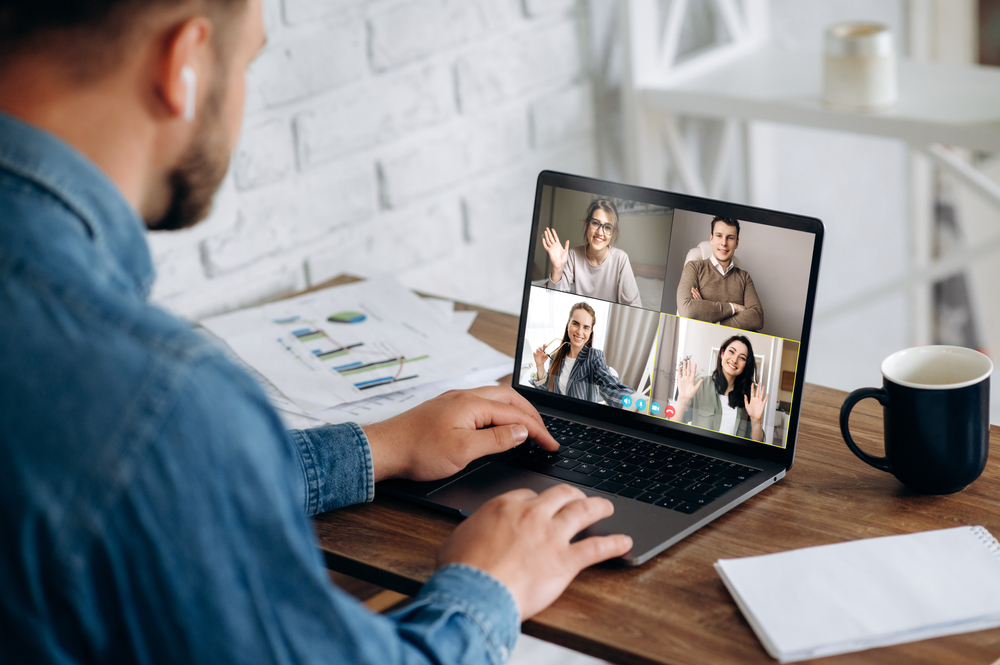 Work online by a video conference with colleagues.