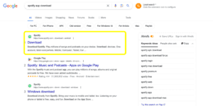 SERP for "spotify app download," demonstrating navigational intent.